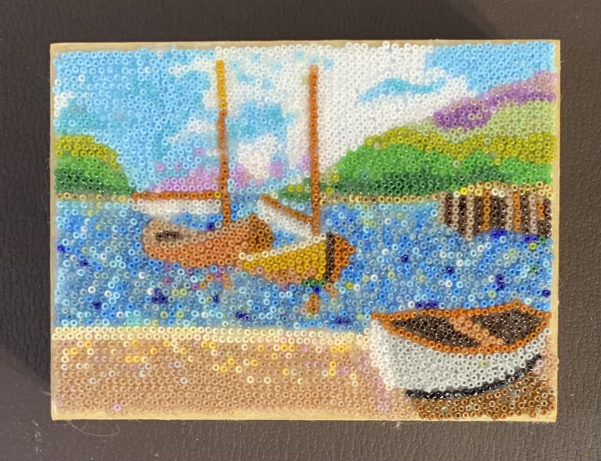 Three boats and a Pier, in beads